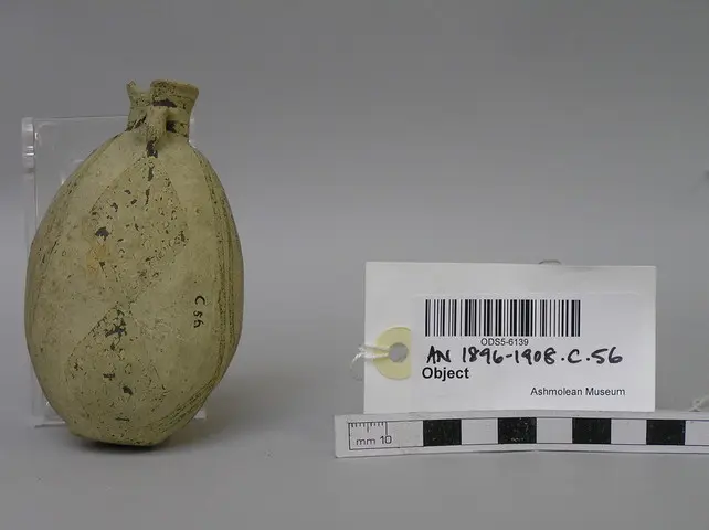 White Painted IV lentil-shaped bottle - image 1